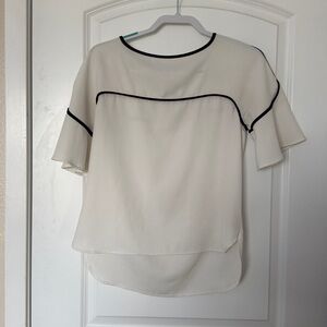 Elegant White Women's Top with Black Trim
